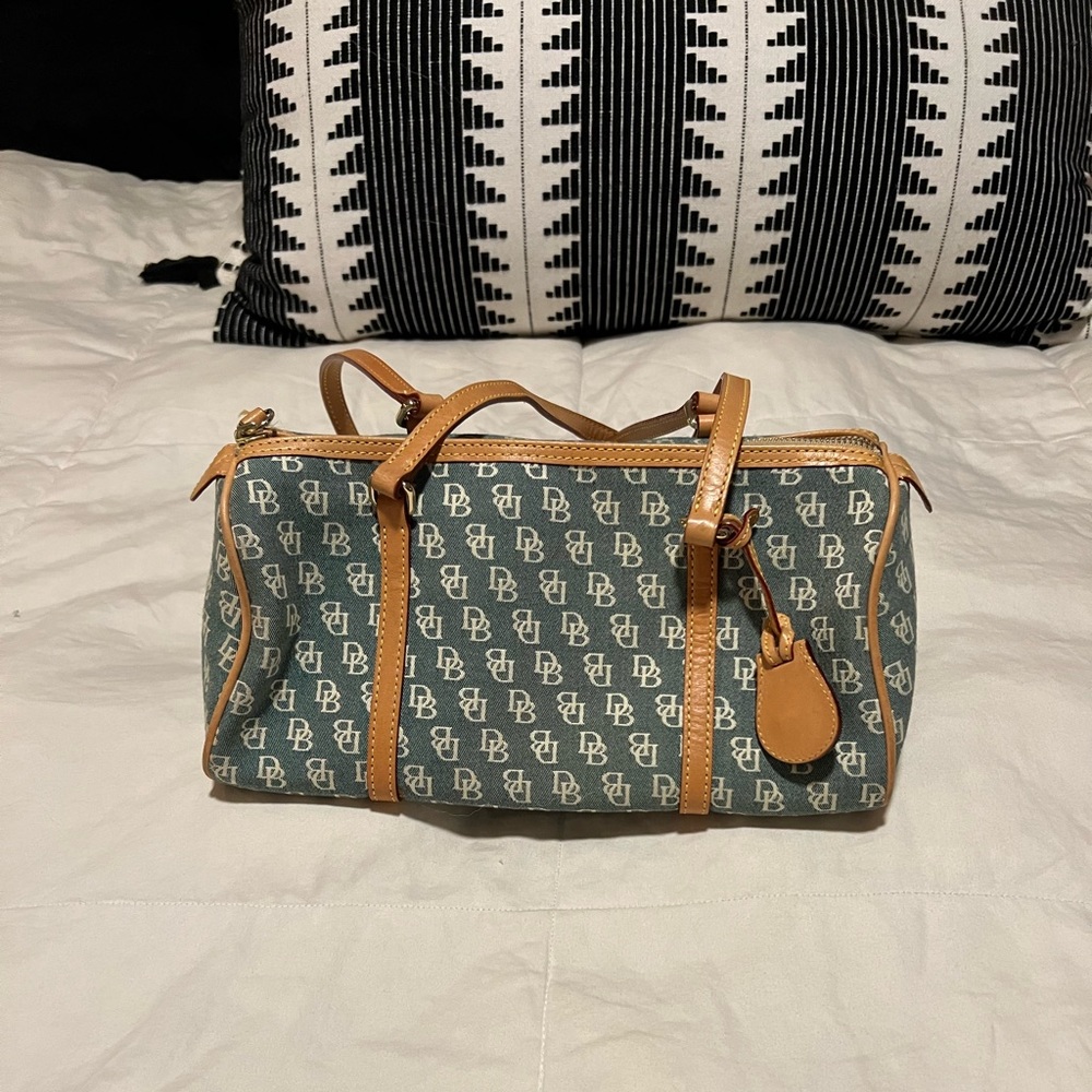 Denim colored Dooney and Burke handbag
